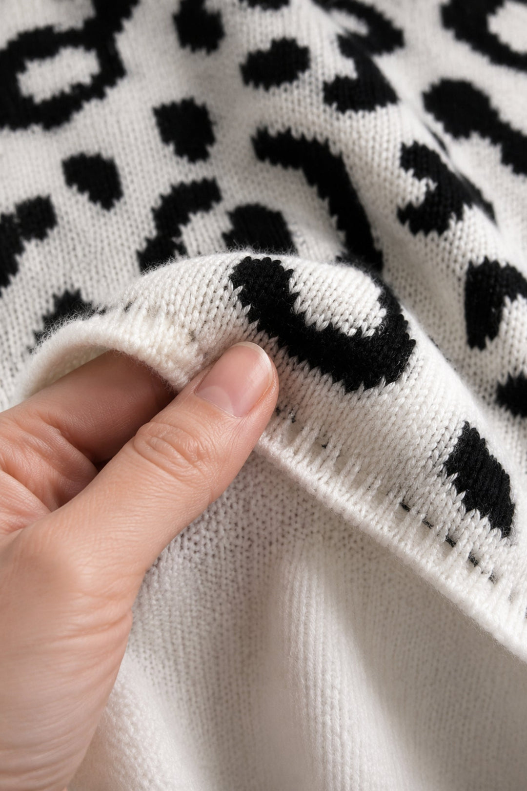 Roxanne | Leopard Print Knit Sweater fabric texture close-up